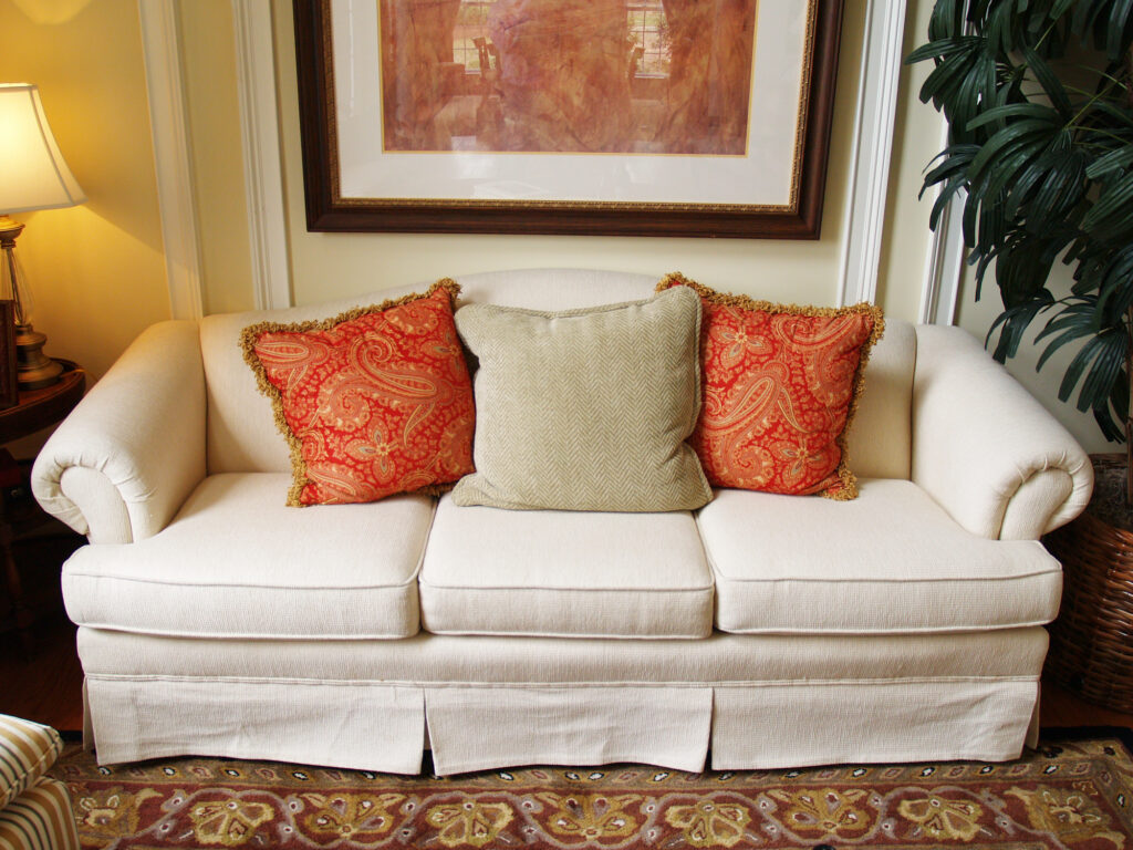 sofa with paisley pattern pillows