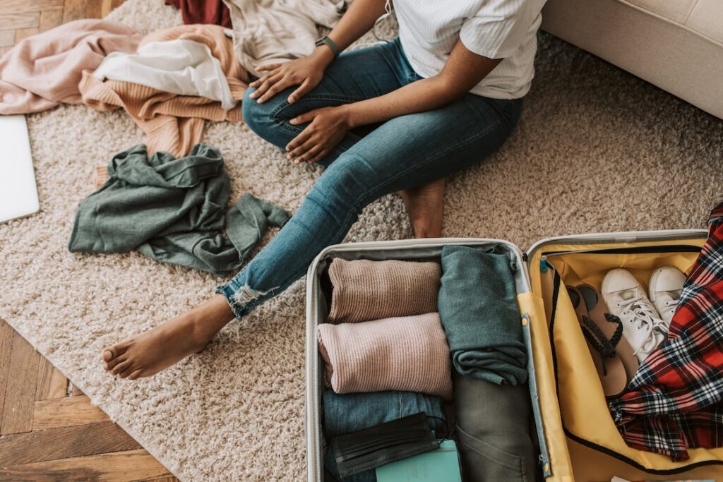 A woman packing her suitcase.