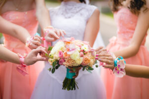 5 Color Trends For 2025 Spring Weddings (Sunset Coral Bridesmaid Dresses)