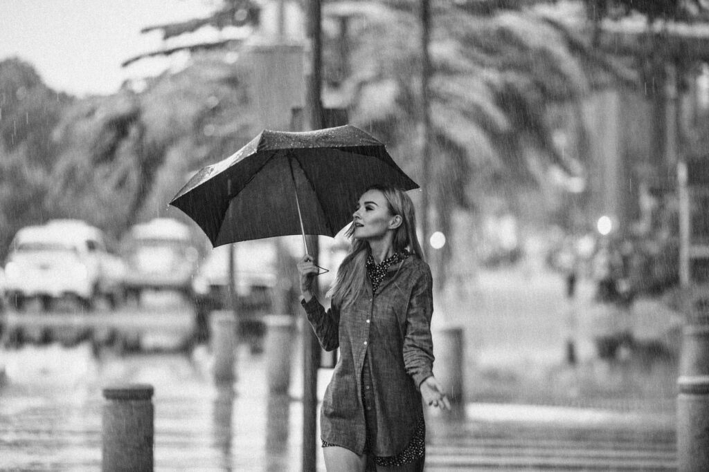 A woman walking in the rain.