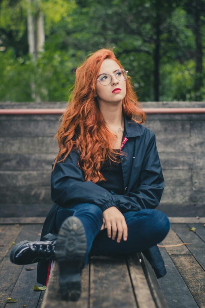 woman with glasses and Terracopper Red Haircolor