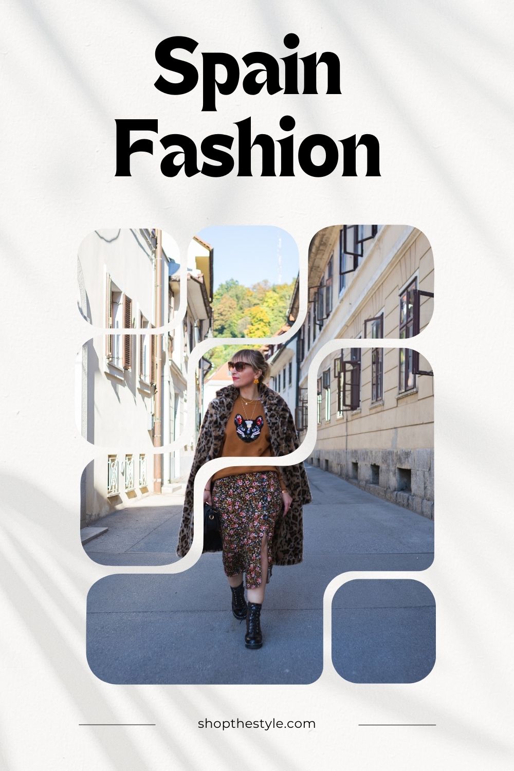 Stylish woman walking down a European street, wearing a mix of bold prints, including a floral skirt, leopard print coat, and graphic sweatshirt, embodying contemporary Spain fashion.